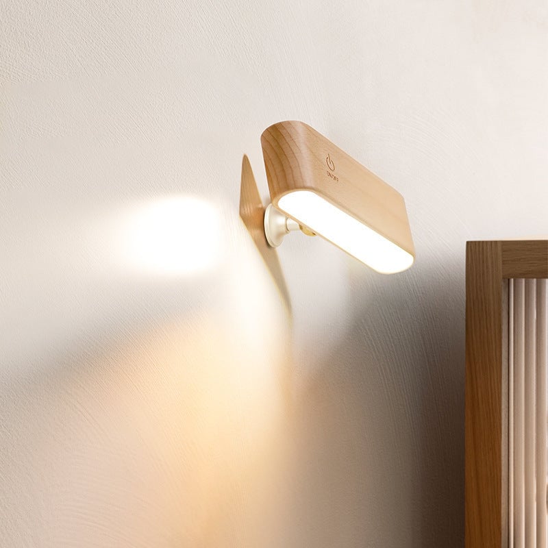Skrivbordslampa i massivt trä med magnetisk laddning